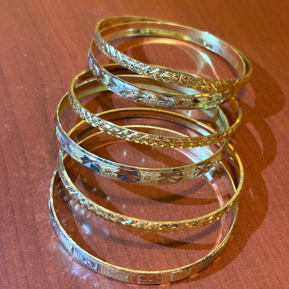 Mixed metal diamond cut bangle bracelet